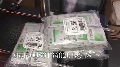Bag labelling machine Sticker pasting machine Plastic bag Label applicator