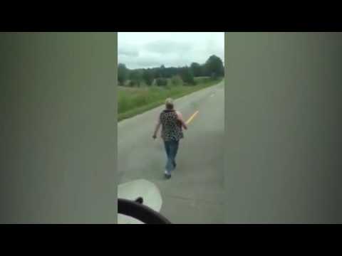 Woman berating garbage man does bizarre chicken dance