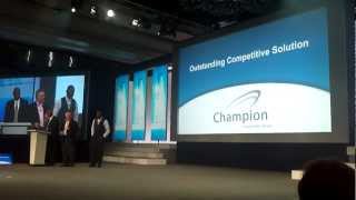 Champion Accepts IBM Beacon Award for Outstanding Competitive Solutions