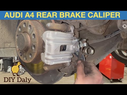 How to replace Audi A4 rear brake caliper - YouTube