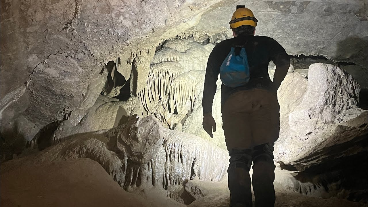 Huge cave leads to amazing crystals and fascinating formations - YouTube