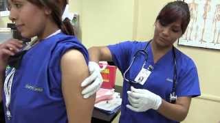 Students Give First Injection | Charter College