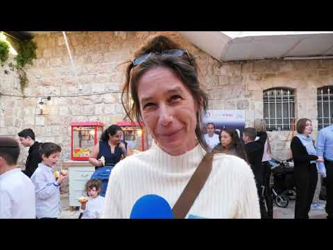 The Friends of Zion Heritage center in Jerusalem hosted a group of 400 widows and orphans to celebrate Hannukah (credit: Eli Mandelbaum)