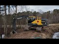 Clearing The Dam And Brush From The Pond