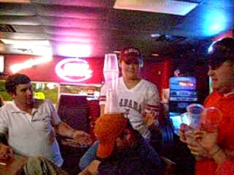 Stacking Cups on Drunk Guy in Bar (response to Met...