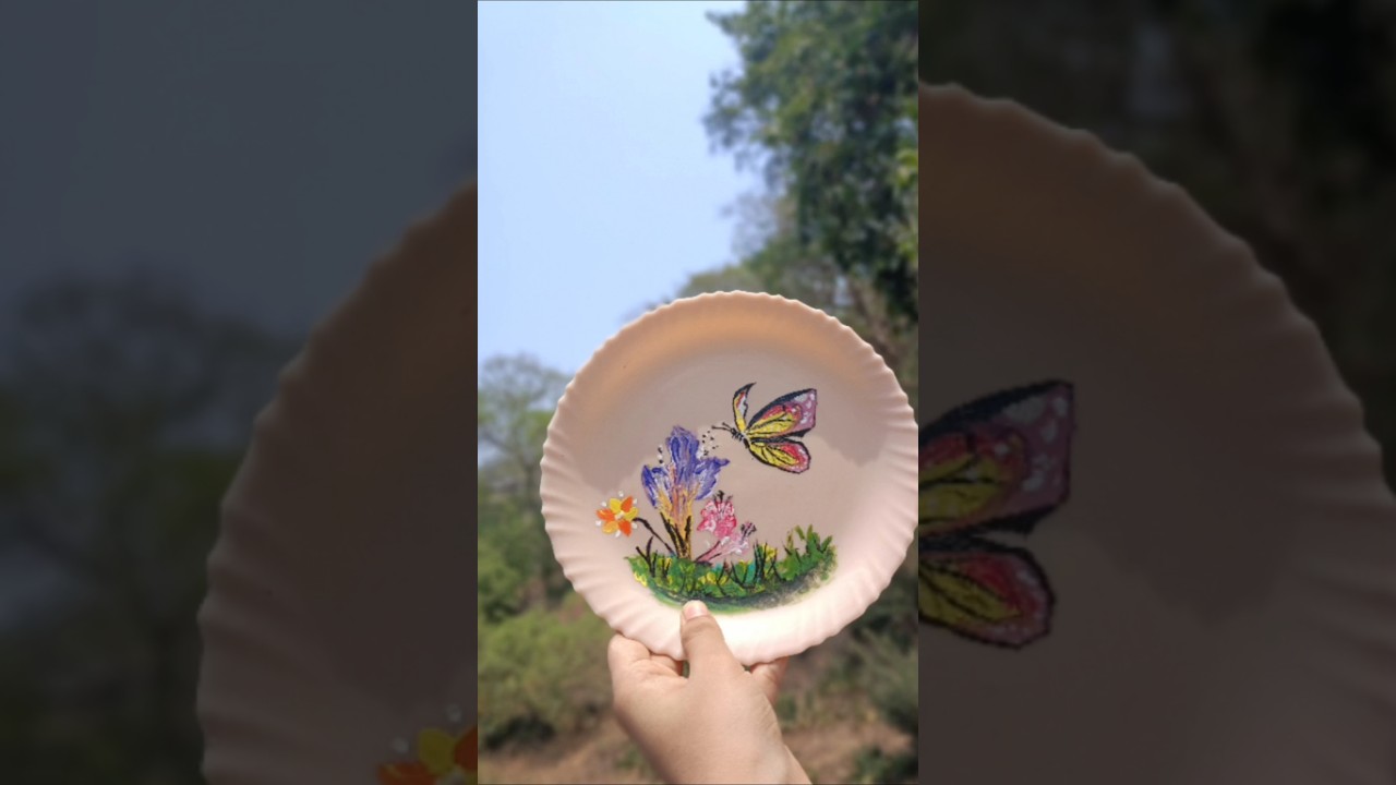 Nature painting on plate..🌿🌺🦋
