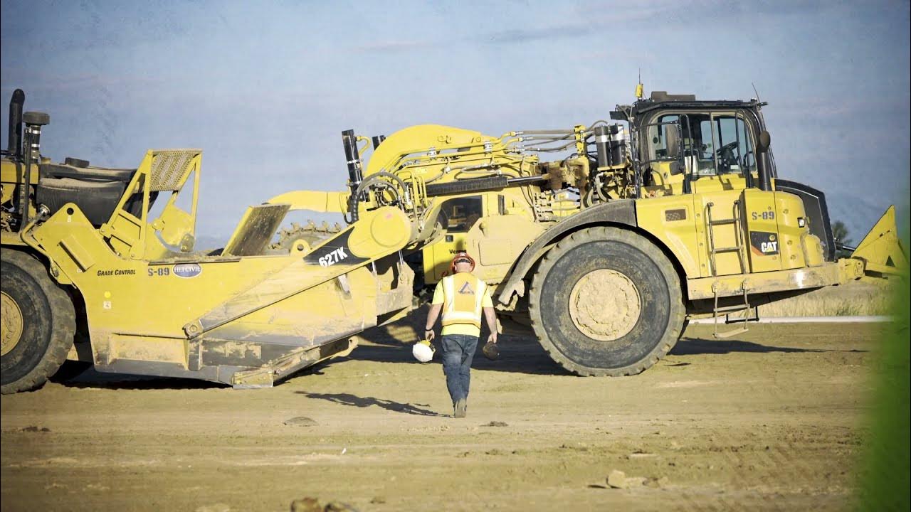 Caterpillar 657g скрепер