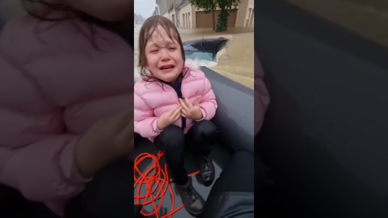 I dove in to rescue a puppy trapped in a car during a flood… 😭🐶 