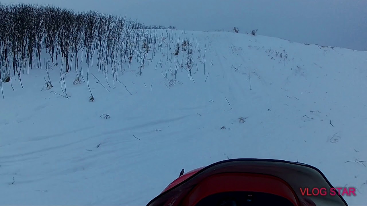 Riding snowmobile!!!(hitting drifts)