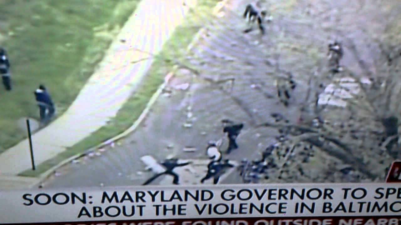 Baltimore riot, riots, rioting, Cops throwing rocks at rioters