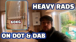 How to hang designer radiators on dot & dab walls