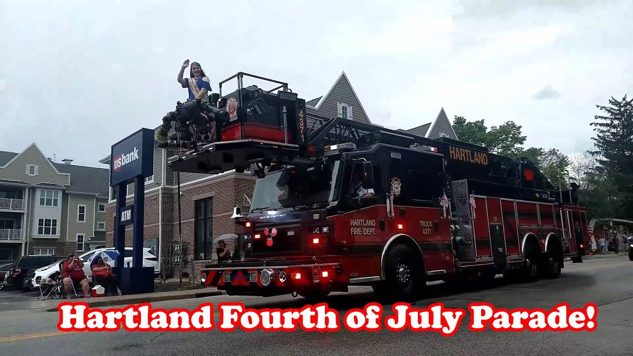 Hartland Fourth of July parade! Fire trucks, big army trucks, a rain