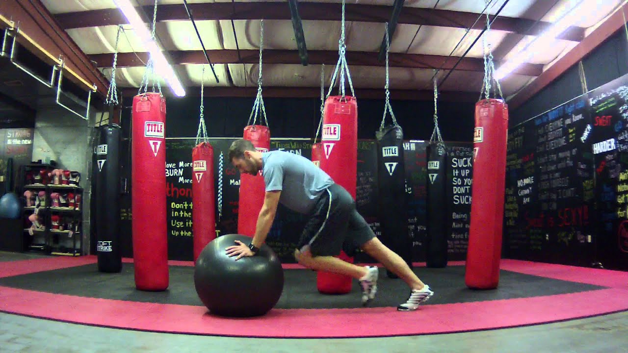 How to do a Swiss Ball Knees to Chest YouTube