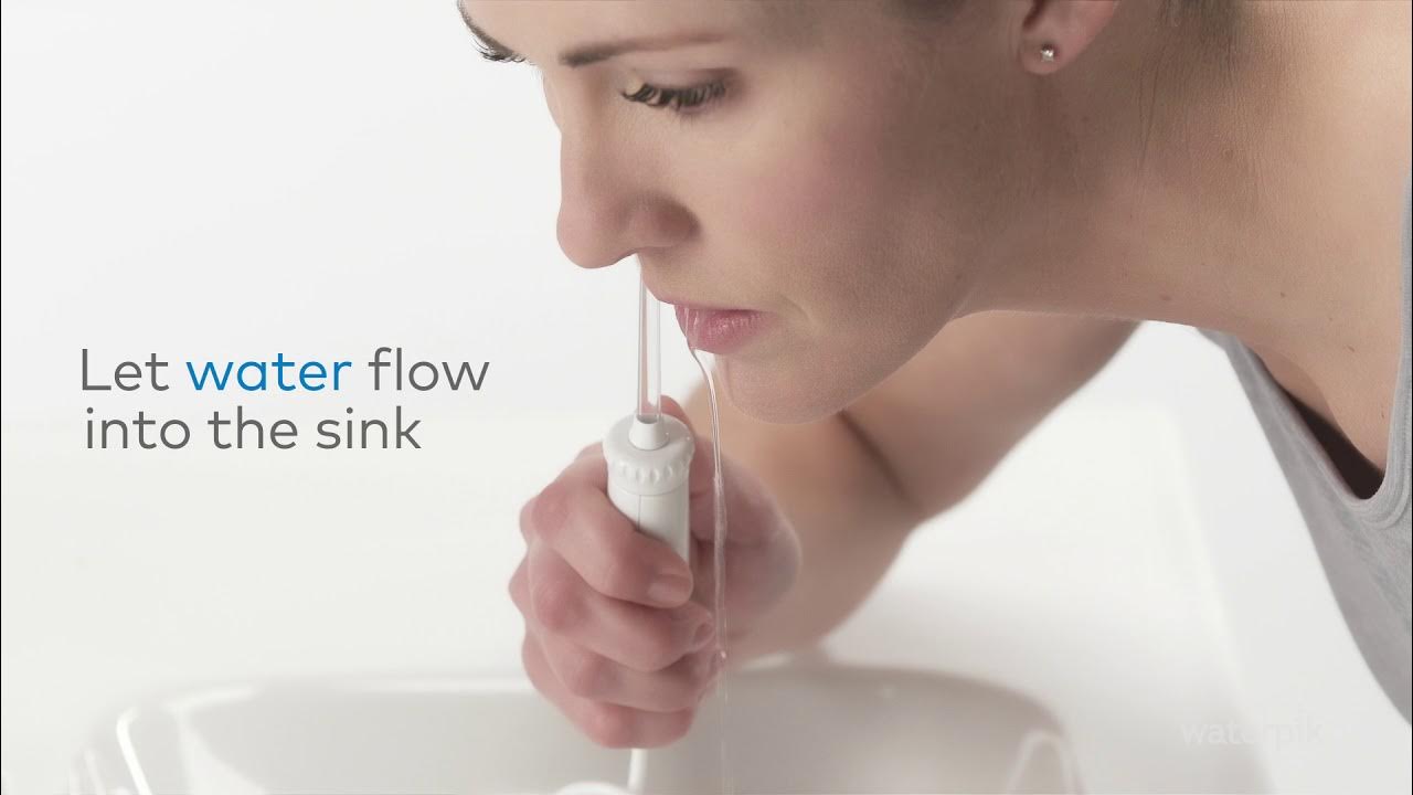 How to Use a Waterpik® Flosser - YouTube