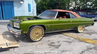 Working on 2 1975 Chevy Verts on 26's at Jug-Head Auto Tunes