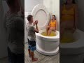 Splashing my boyfriend with orange juice from the worlds largest toilet shorts