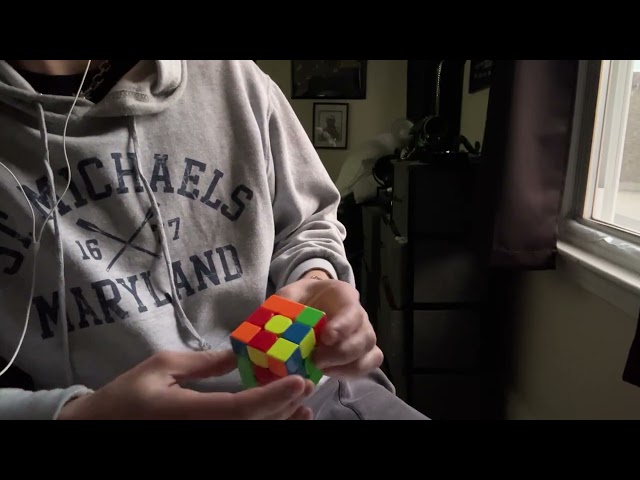 ASMR- Insane man talks to himself and solves a Rubik’s cube 