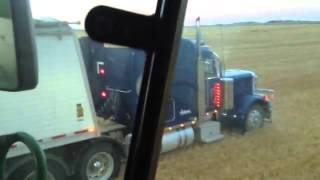 Unloading on the go onto Semi