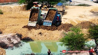 Beautiful Landfill Process Komatsu D31P Dozer Push Soil Into Water & Mini Dump Trucks Unloading Soil