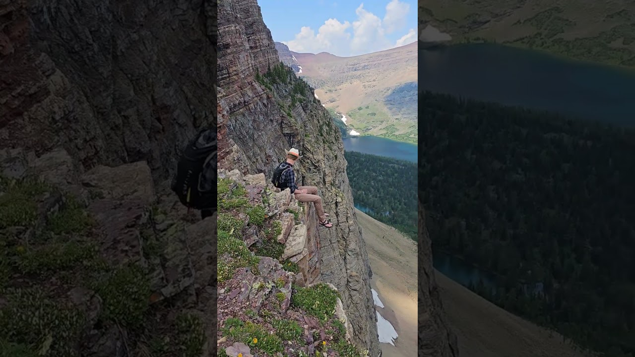 Crazy dude sitting on the edge of a sheer 1000 foot cliff!
