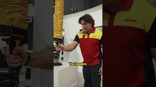 How do we lift a 20 kg parcel with ONE hand?