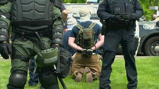 31 members of white supremacist group arrested near Idaho pride event, charged with 'conspiracy to r