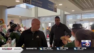 Packer fans send the team off to Chicago ahead of Wild Card matchup with the Bears
