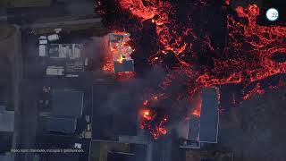 Dronevideo viser huse sat i brand af rødglødende lava i Grindavík på Island!