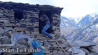 Building survival Shelter only with Stones.Winter survival bushcraft shelter..