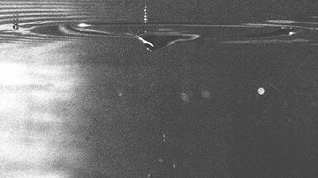 A plunging liquid jet on a free pool surface forced with capillary waves at a 20 Hz frequency