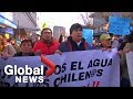 Chileans take to the streets to protest fuel spill that left city without drinking water