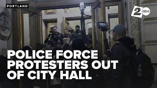Portland police remove protesters after disruption of City Council meeting