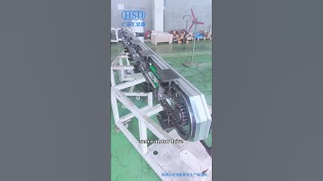 Vertical curved guide rail conveyor. Customized automated circulating chain pallet conveyor systems