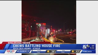 Part of roadway closed as crews battling Seymour house fire
