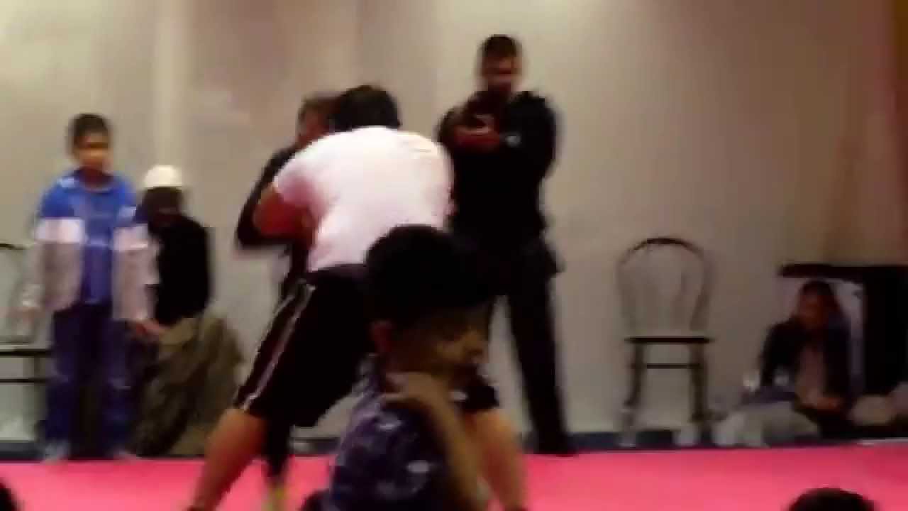A built guy fighting an Islamic wrestler YouTube