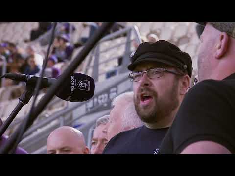 The Albany Shantymen perform a sea shanty at the Optus Stadium in Perth