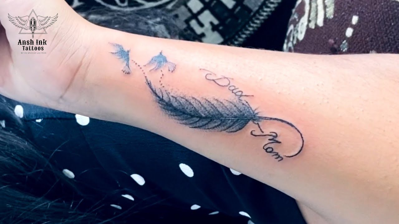 Wrist Feather Tattoos Designs for Women