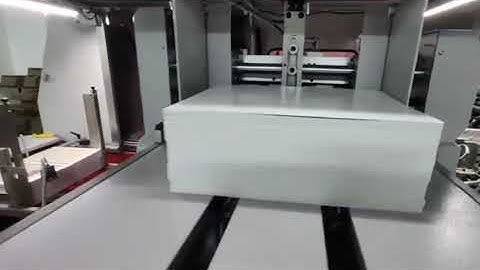 Board Book Casing in Machine, children book casing in machine, photo book casing in machine