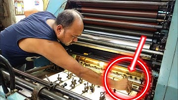 Heidelberg printing press machine working. Heidelberg printing machine working.