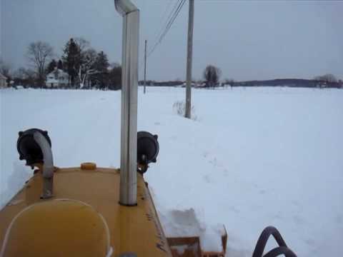 Caterpillar D2 plowing snow with Reggie the Dachshund - 2