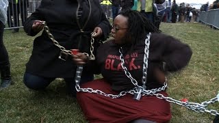 Black Lives Matter Activists Chain Themselves Together to Block Inauguration Checkpoint