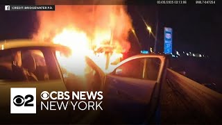 Video shows police officer saving driver from burning car in New Jersey