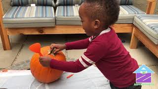 Carving a Happy Face Pumpkin!! Toddler Outdoor Fun!