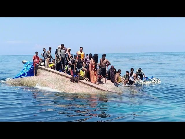 Desperate, dehydrated Rohingyas picked up in dramatic sea rescue | AFP class=