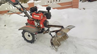 Simple idea how to make a snow cleaning device with a motor cultivator