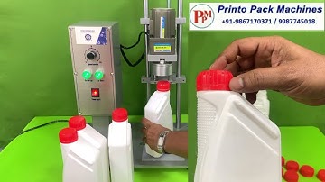 Engine oil bottle cap sealing machine, Engine oil bottle capping machine, Engine oil packing machine