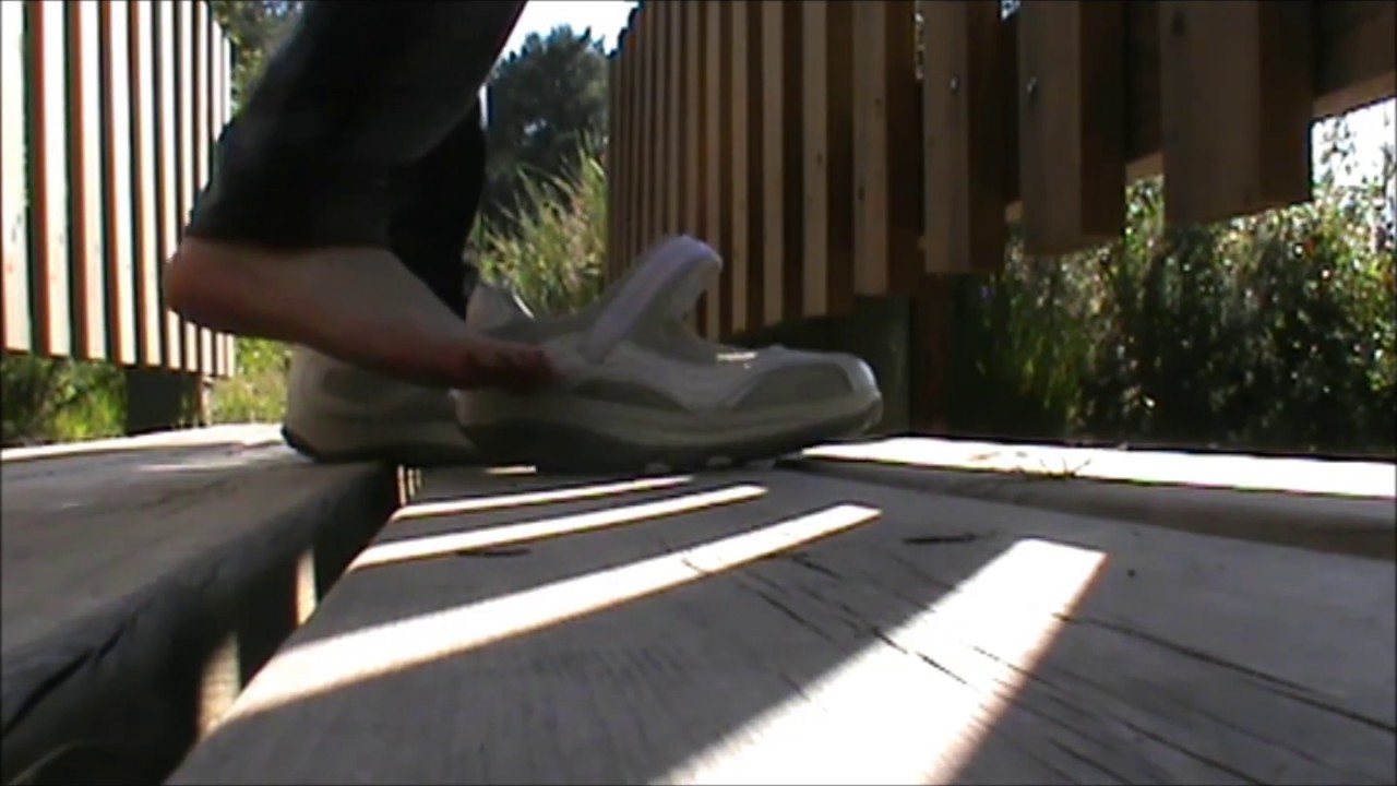 Playing barefoot with my white Skechers Sleek Fit