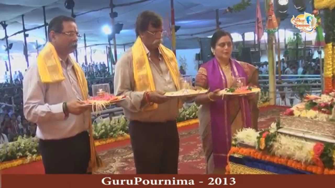 Sadguru Shree Aniruddha Bapu doing Paduka Pujan of his ShreeGuru (GuruPaurnima 2013)