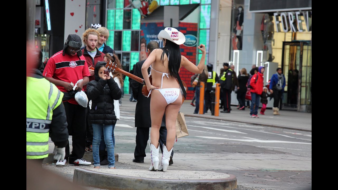 Naked Cowgirl on Times Square Manhattan NYC 2013Playing guitar and posing f...