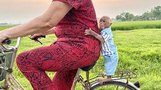 Grandma took Bibi for a walk to see the countryside and buy candy!